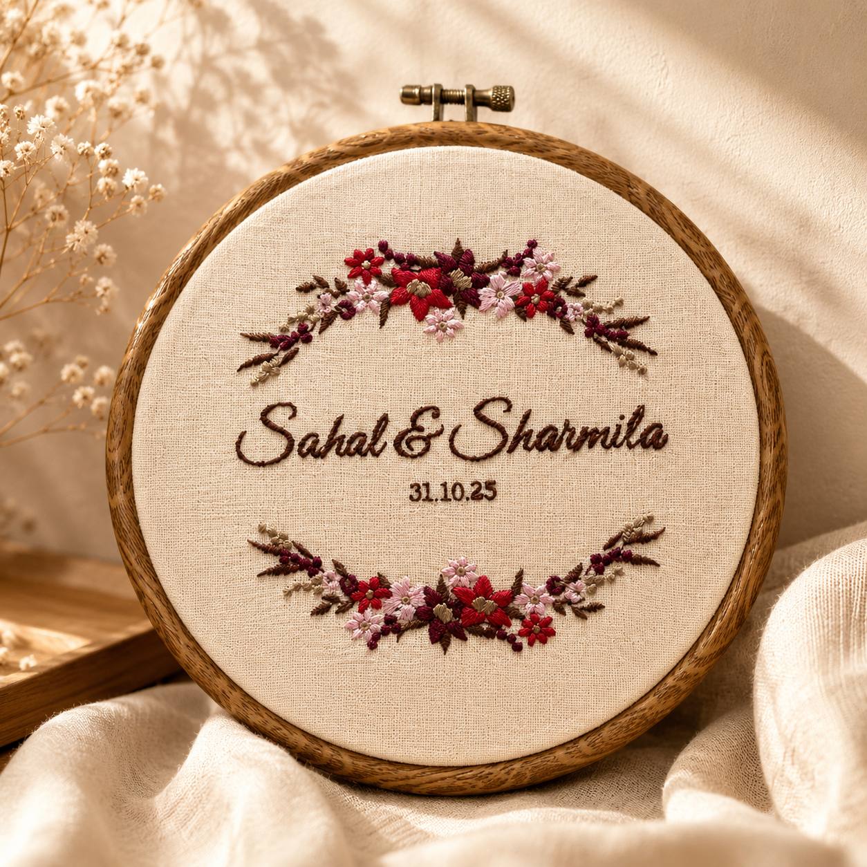 Wedding names and floral embroidery in a hoop